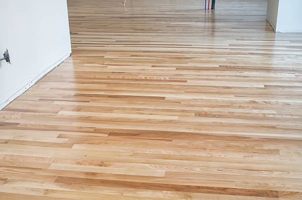 istock Home renovation with newly varnished hardwood floor 616092248