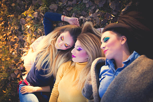 istock Friends lying on the ground 616092312