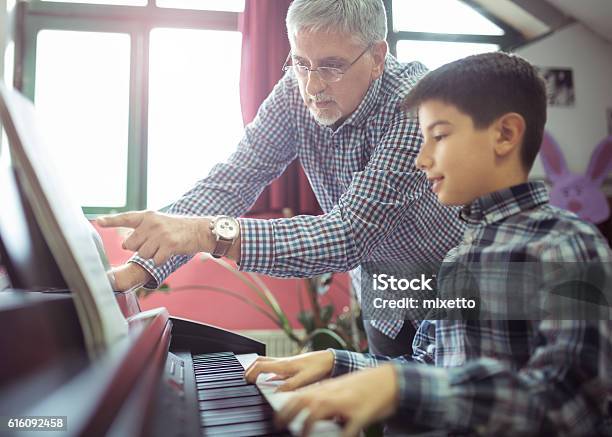Piano Class Stock Photo - Download Image Now - Instructor, Piano, Boys