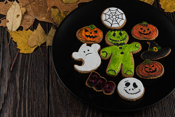 istock Homemade delicious ginger biscuits for Halloween 616093772