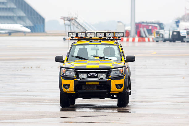 Follow me car at the airport Sofia, Bulgaria - October 16, 2016: Follow me car is waiting at the Sofia airport for Lufthansa's Airbus A380 airplane to land. pleso stock pictures, royalty-free photos & images