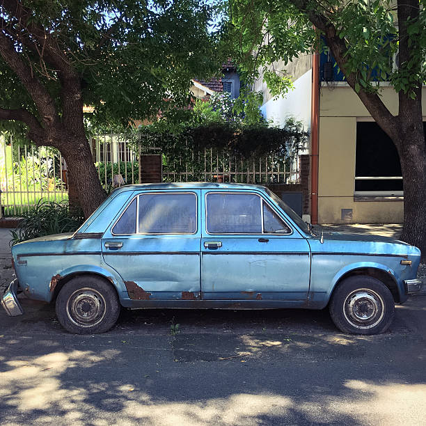 istock Old car parked in the street 616097036