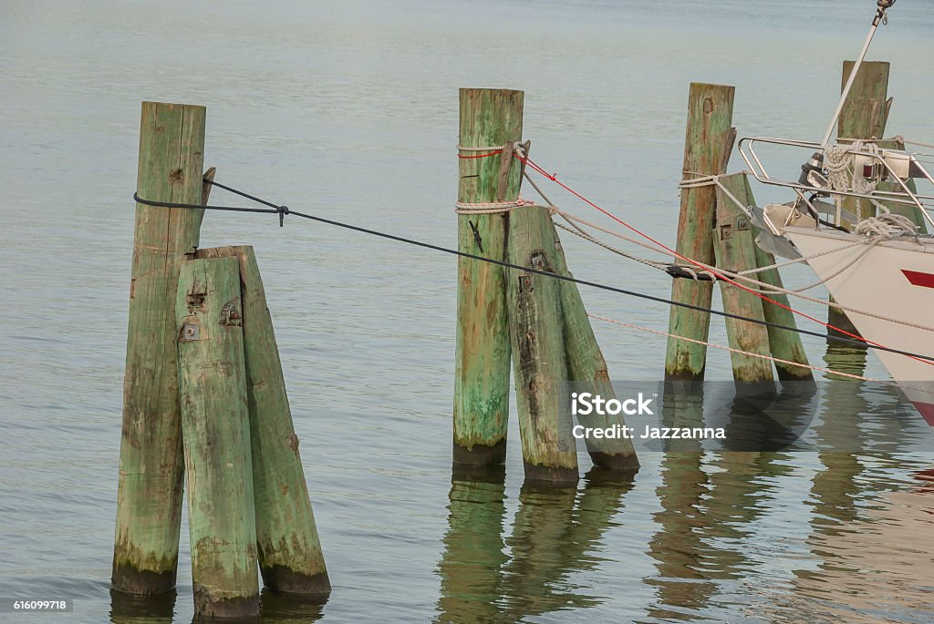 Boat mooring in a row by the sea Blue Stock Photo