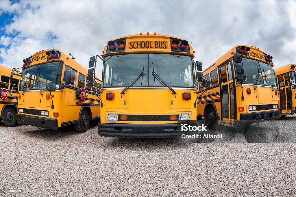 American School Buses Fisheye view on parked American Buses in St. George, Utah, USA. School Bus Stock Photo