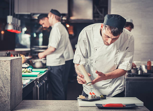 sushi  preparing in the restaurant kitchen stock photo