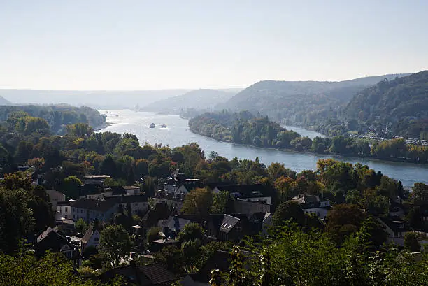 View from Drachenfels at Siebengebirge uplands across Bad Honnef and Rhine river valley with islands Nonnenwerth and Grafenwerth at Remagen in fall. Northrhine Westfalia, Germany. October 2016