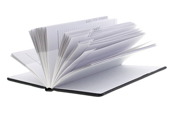 istock opened Notebook isolated on white background. Diary of a businessman. 616103168