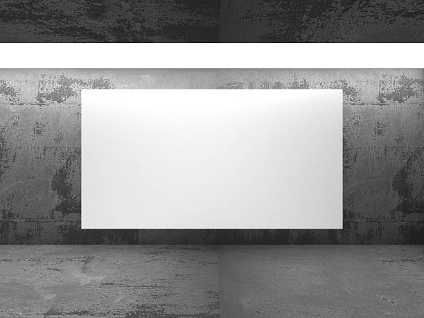 istock White blank banner billboard in dark concrete wall room 616105344