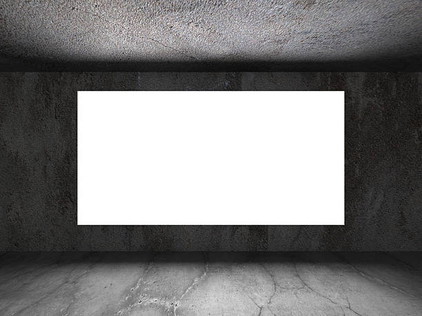 istock Light blank banner billboard in dark concrete walls room interio 616106252