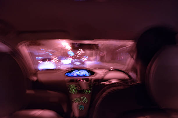istock Blur image of man driving car 616106862