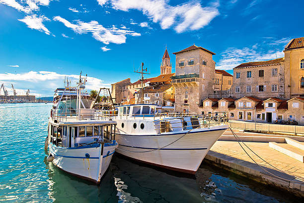 Trogir boats and waterfront view, UNESCO town in Croatia landmarks