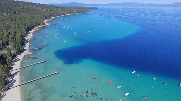 Lake Tahoe Aerial photo of Rubicon Bay of Lake Tahoe taken with drone shades of blue stock pictures, royalty-free photos & images