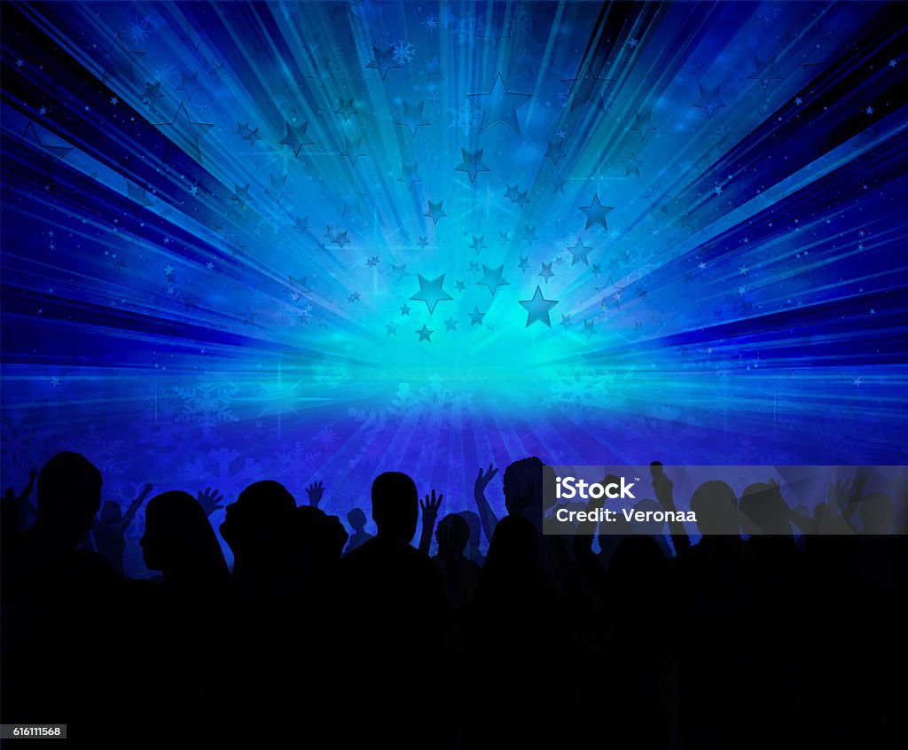 Crowd wathcing fireworks and celebrating New Year concept - cheering crowd and fireworks. Adult Stock Photo