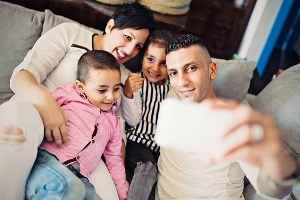 istock Real mixed race spouses of different religious with kids 616113232
