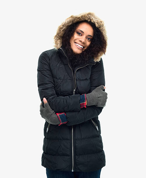 istock Cheerful woman standing with arms crossed 616113316