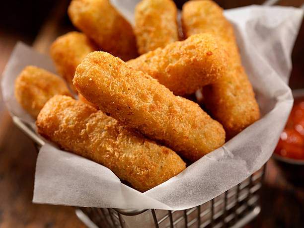 istock Basket of Mozzarella Cheese Sticks 616113516