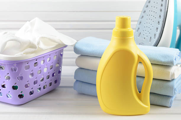 blank yellow detergent bottle - liquid soap blue plastic textile imagens e fotografias de stock