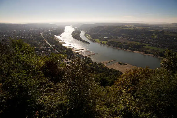 View from Drachenfels at Siebengebirge uplands across Rhine river valley with islands Nonnenwerth and Grafenwerth at Bad Honnef in fall. Northrhine Westfalia, Germany. October 2016