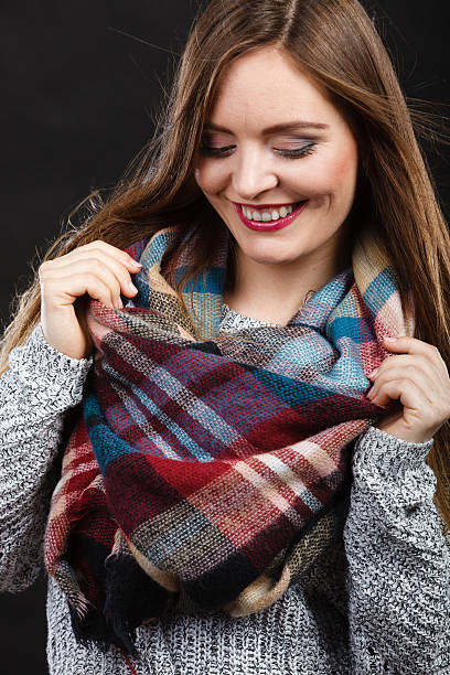 istock Attractive woman wearing checkered scarf. 616117188
