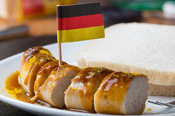 currywurst with german flag currywurst with german flag german food photos stock pictures, royalty-free photos & images