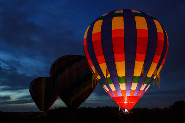 istock Hot Air Balloons at Night 616117702