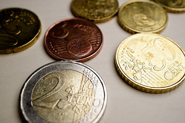 istock Coins and tape measure 616119292