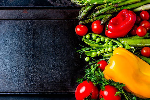 istock Food background with fresh organic vegetables. top view 616121204