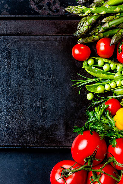 istock Food background with fresh organic vegetables. top view 616121498