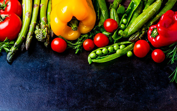 istock Food background with fresh organic vegetables. top view 616121580