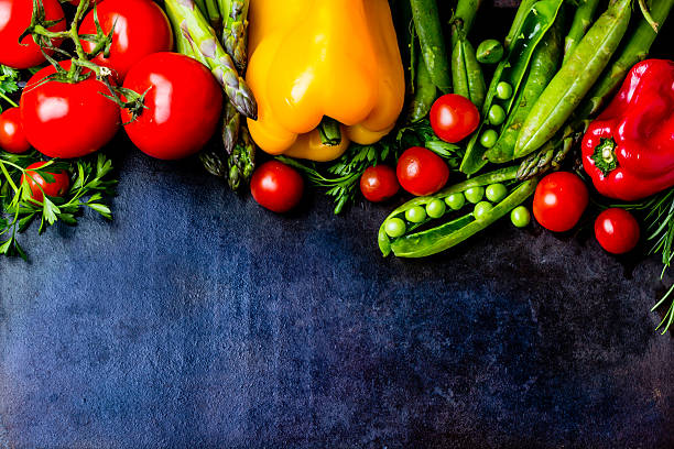 istock Food background with fresh organic vegetables. top view 616121686