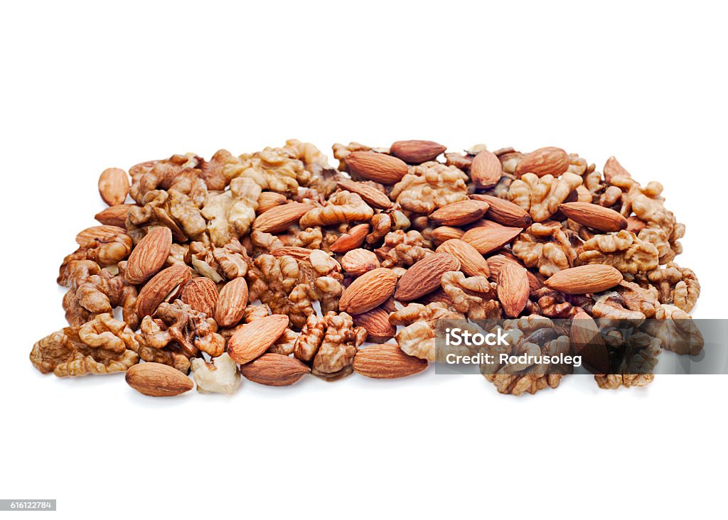 Nuts mix isolated on white background. Nuts mix isolated on white background. Closeup. Almond Stock Photo