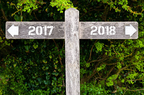 istock Year 2017 versus 2018 directional signs 616125760