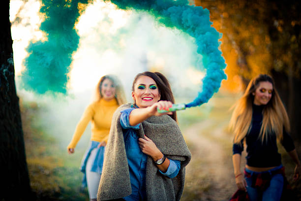 istock Girls playing with smoke 616125882