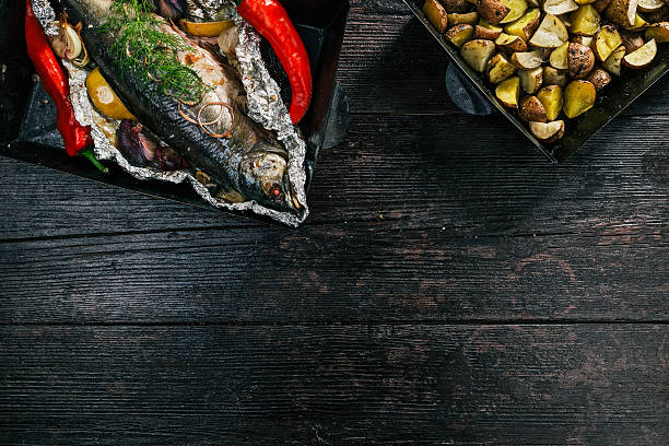 Salmon and potato baked on tray