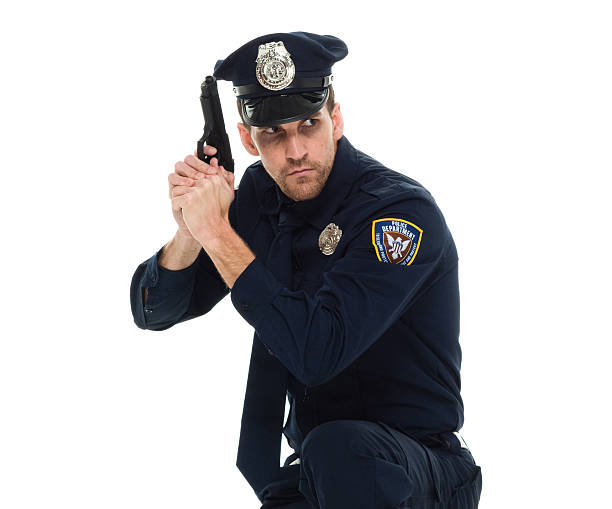 istock Police in action with gun 616127206