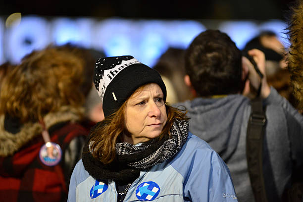 Hillary Clinton and Tim Kaine Campaign Together in Philadelphia, Pennsylvania Philadelphia, PA, USA - October 22, 2016: Voters gather as Democratic presidential candidate Hillary Clinton and running mate Sen. Tim Kaine are scheduled to campaign together in Philadelphia, PA hillary clinton stock pictures, royalty-free photos & images