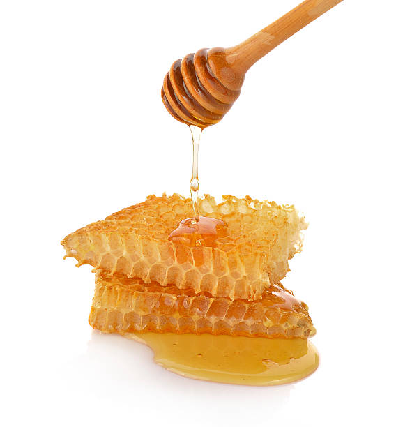 istock Honeycomb close up on a white background 616128950