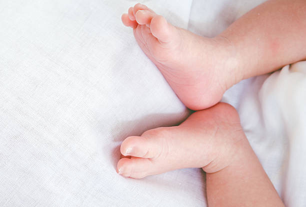 istock New born baby feet 616132038