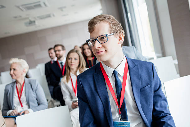 istock Businessman attending seminar in convention center 616220734