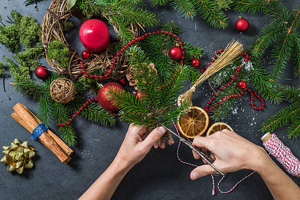 istock Artisan woman working on handmade Christmas decorations 616222036