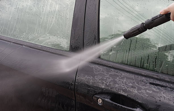 istock Car Washing. Cleaning Car Using High Pressure Water 616222044
