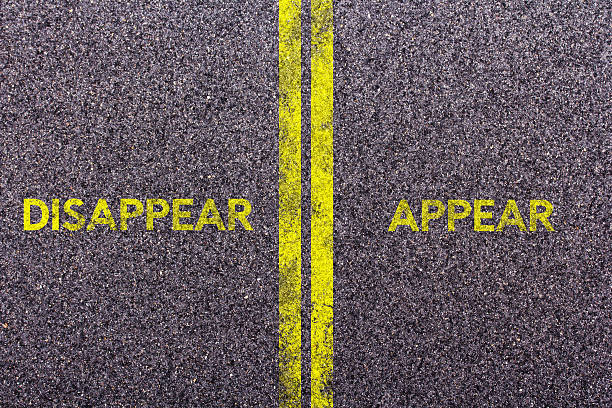 istock Tarmac with the words disappear and appear 616222400