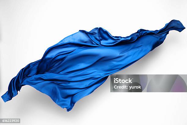 Abstract Blue Fabric In Motion Stock Photo - Download Image Now - Textile, Blue, Flowing