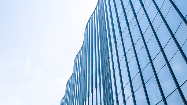 perspective and underside angle view to textured background of c - mullion windows imagens e fotografias de stock