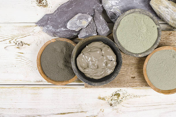 Ancient minerals - ochre, green, blue clay powder, mud mask Ancient minerals - green and blue clay powder and mud mask for spa, beauty concept facial mask beauty product stock pictures, royalty-free photos & images