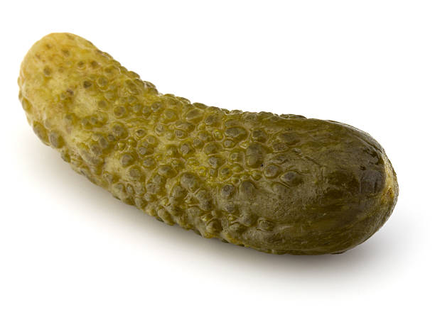 istock pickled or marinated  cucumber isolated on white background 616226460