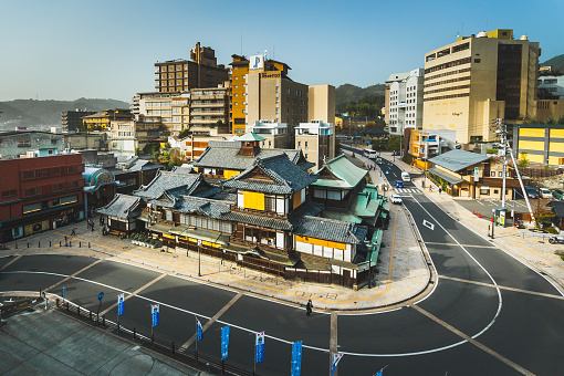 Matsuyama, Japan - November 12, 2010: Overhead shot of Dogo Onsen Honkan, the oldest hot-spring resort in Japan and the inspiration for the bathhouse in 'Spirited Away' by Studio Ghibli