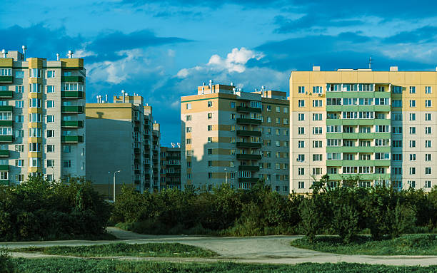 istock urban buildings on blue sky background 616227584
