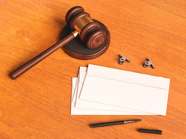 istock Judge's gavel on wooden table. 3D illustration 616229604