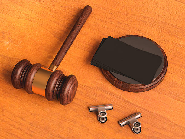 istock Judge's gavel on wooden table. 3D illustration 616229810